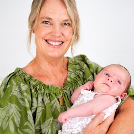 Cathy McCormick, IBCLC, holding a newborn baby